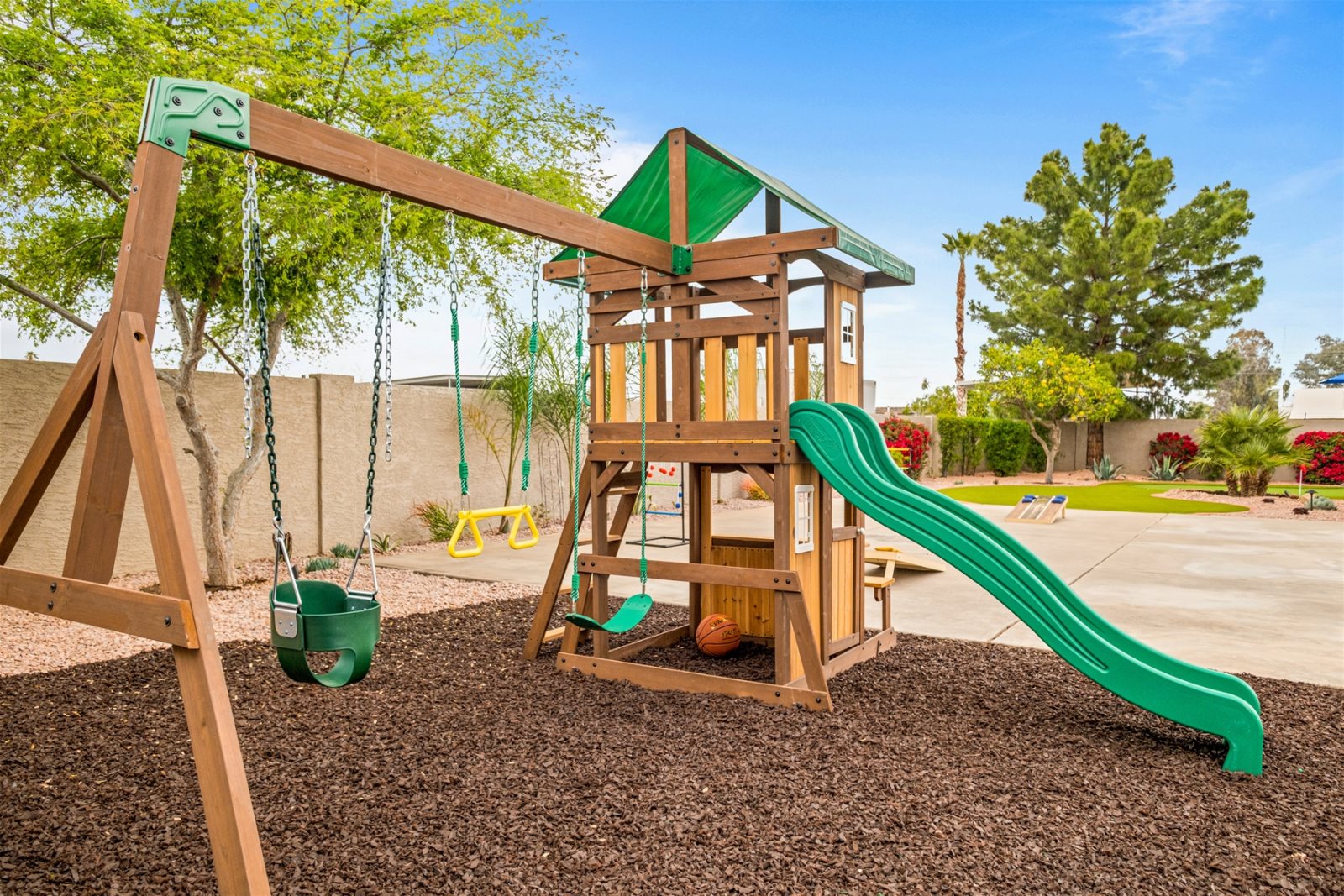 The littles will love spending time at the park in your backyard