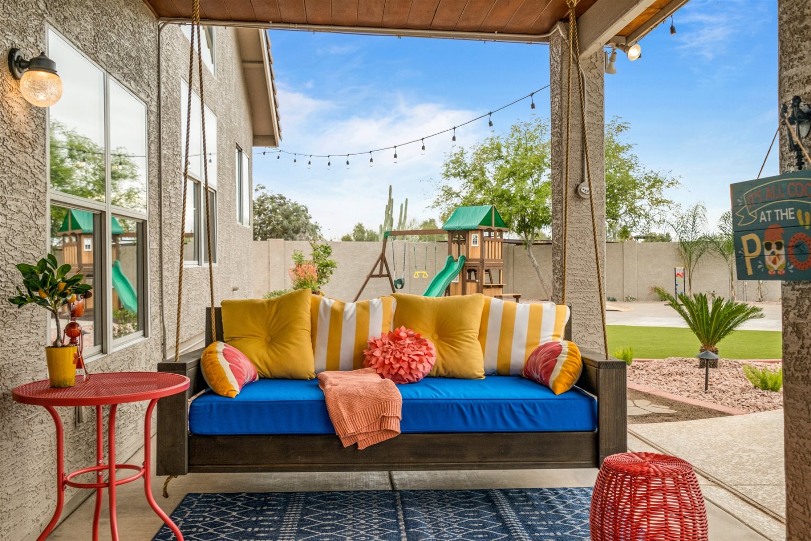 Imagine yourself napping on this poolside daybed swing every afternoon.